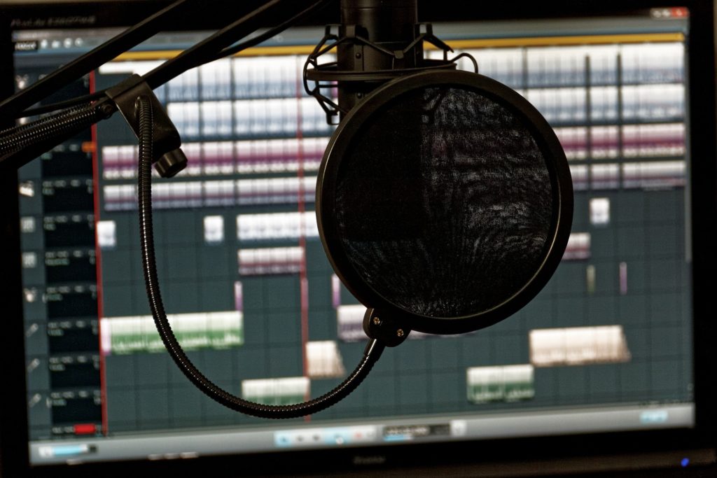Mic with pop filter and a Digital Audio Workstation